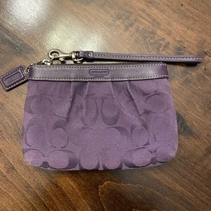 Coach wristlet purple.